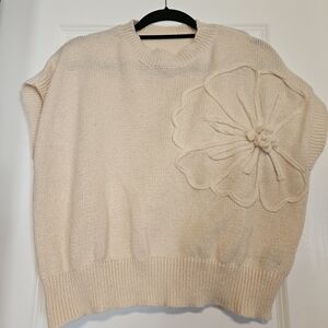 Elegant Cream Sweater with Floral Accent
